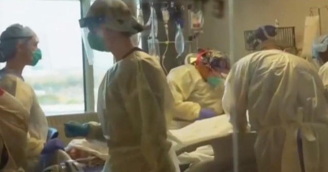 U.S. fights coronavirus surge amid record new cases