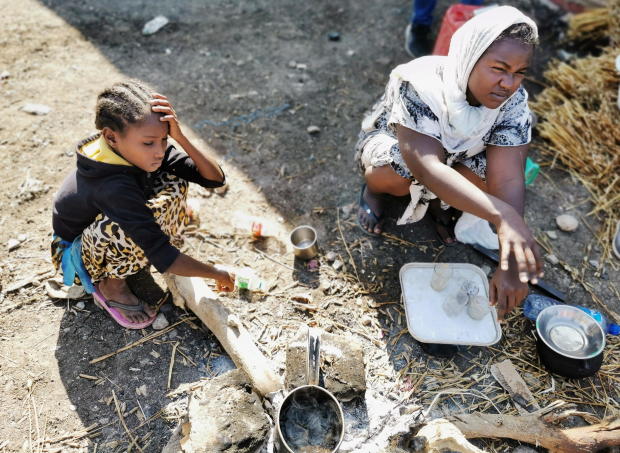 Ethiopian children, who fled the ongoing fighting in Tigray region, are seen at the al-Fashqa refugee camp in the Sudan-Ethiopia border town of al-Fashqa, in eastern Kassala state 