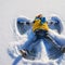 Boy making a snow angel 