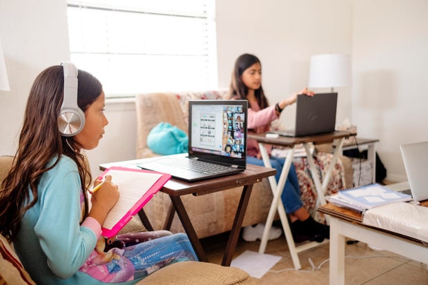 Children Participate in E-Learning Activity at Home