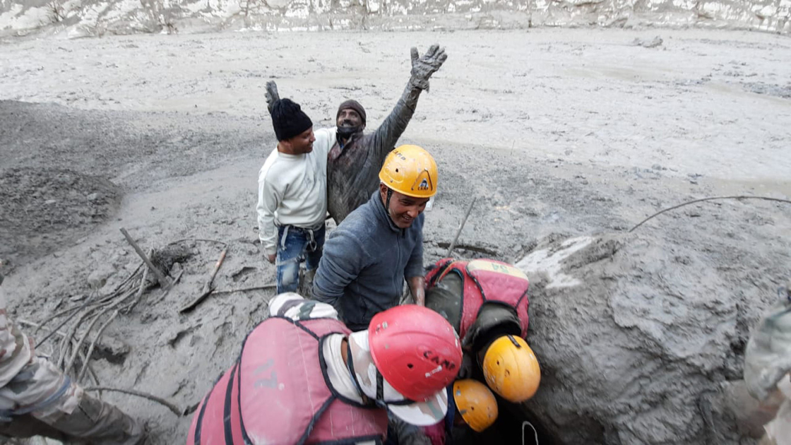 At least 26 dead, dozens missing after glacier collapse unleashes a wall of water in India
