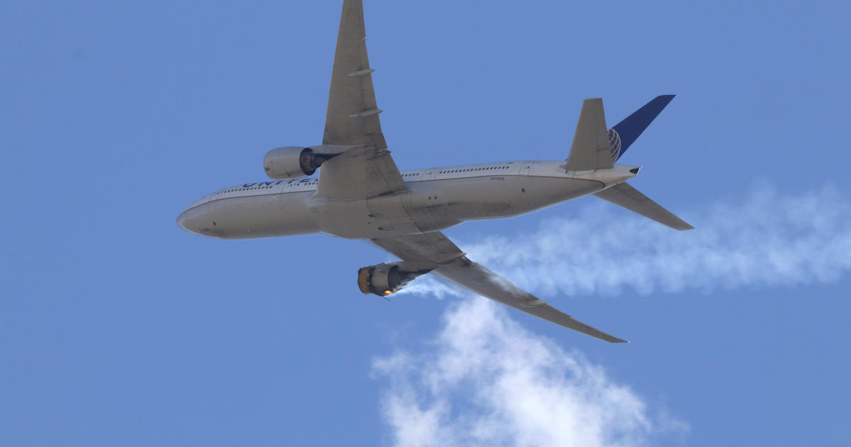 United Airlines engine explosion over Denver prompts company to ground Boeing 777s - CBS News