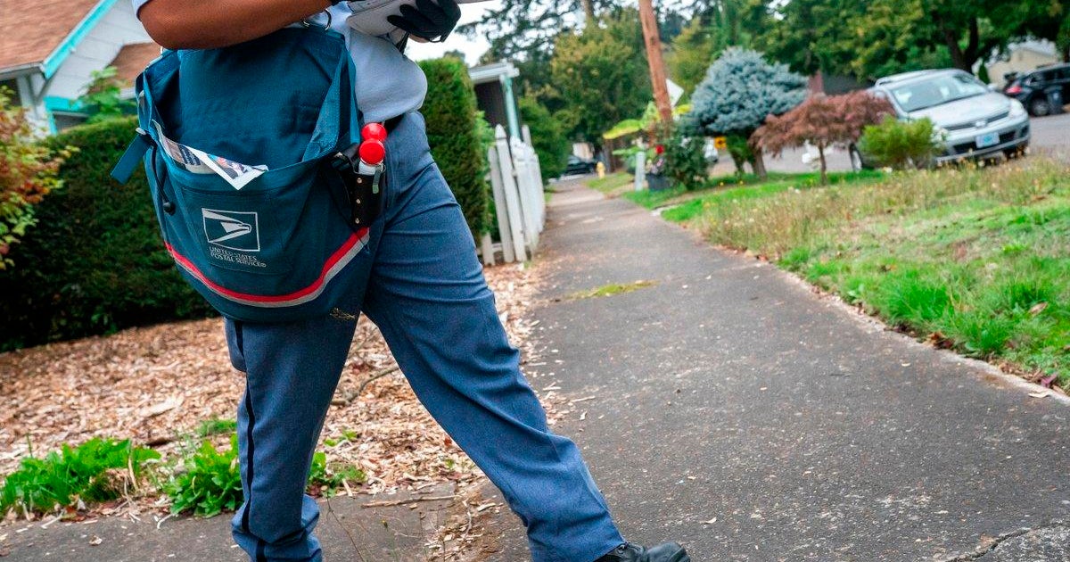 In the U.S., postal service workers not a priority for COVID-19 shots