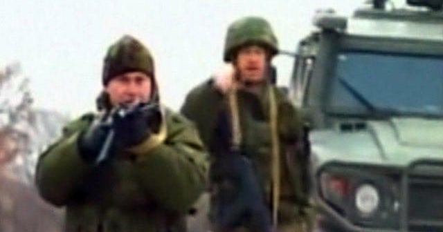 Russian troops fire warning shots in Ukraine