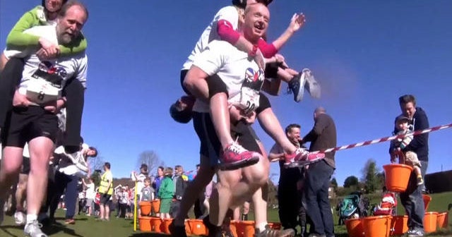 Watch: Wife-carrying race held in U.K.