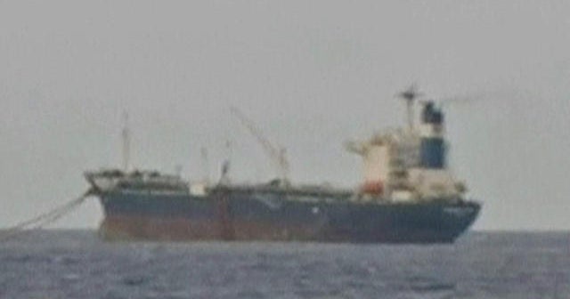 Navy takes control of hijacked oil tanker