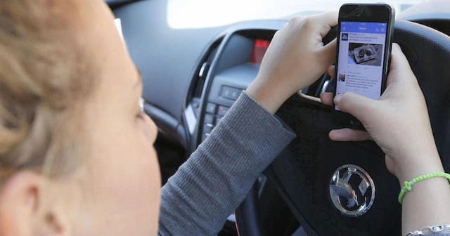 Drivers blame addiction for phone use while driving