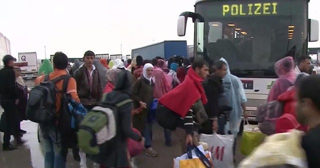 Flood of migrants arrive in Austria after overwhelming Hungary