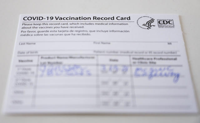 As Covid Restrictions Loosen The Debate Over Vaccine Passports Intensifies Cbs News