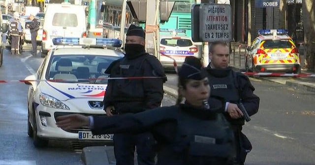 Paris police shoot and kill armed suspect