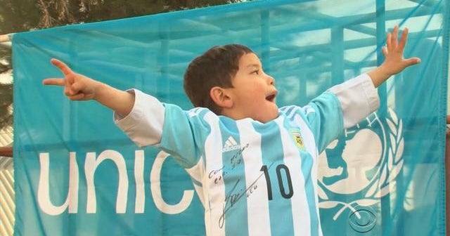 Afghan boy scores soccer jersey of his hero