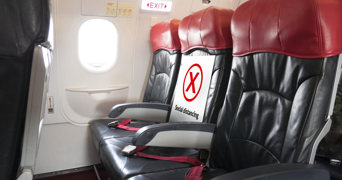 Blocking middle seats on planes reduces virus exposure, study says