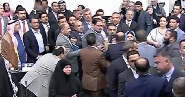 Watch: Iraqi politicians fight in parliament session