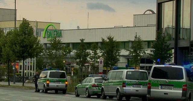 Munich police tell people to take shelter after shooting