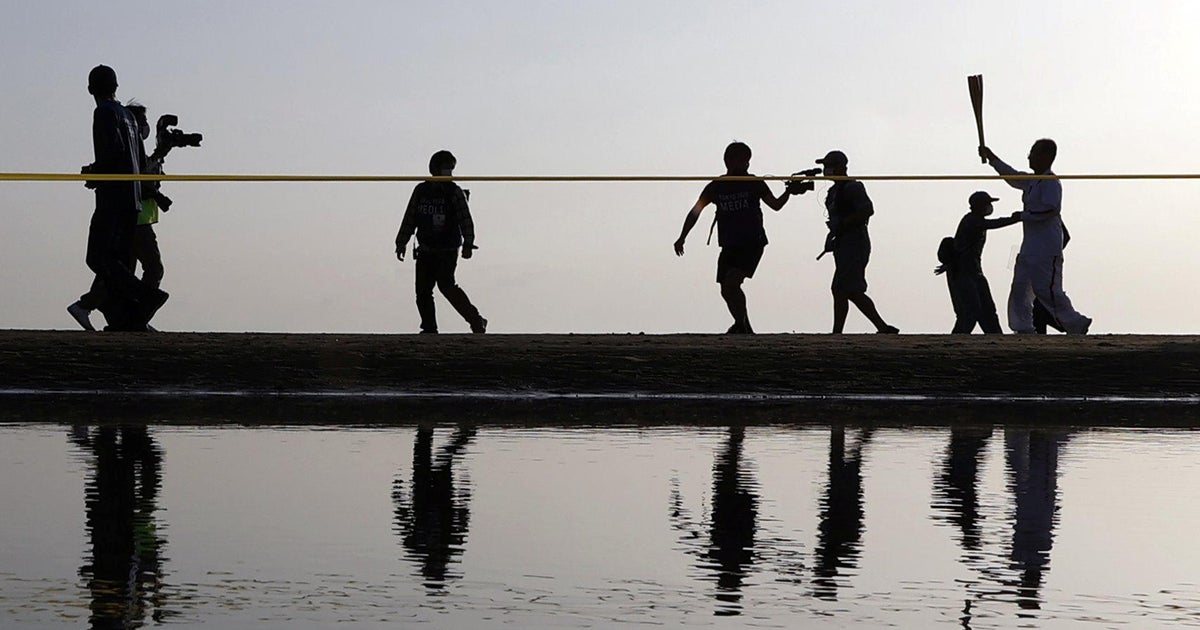 Japan confirms 1st case of COVID linked to Olympic torch relay