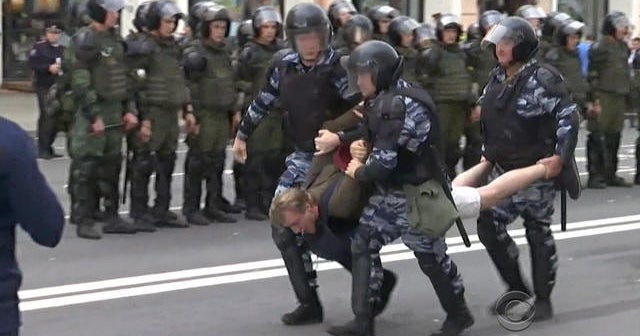 Putin rival arrested as anti-corruption protests sweep Russia
