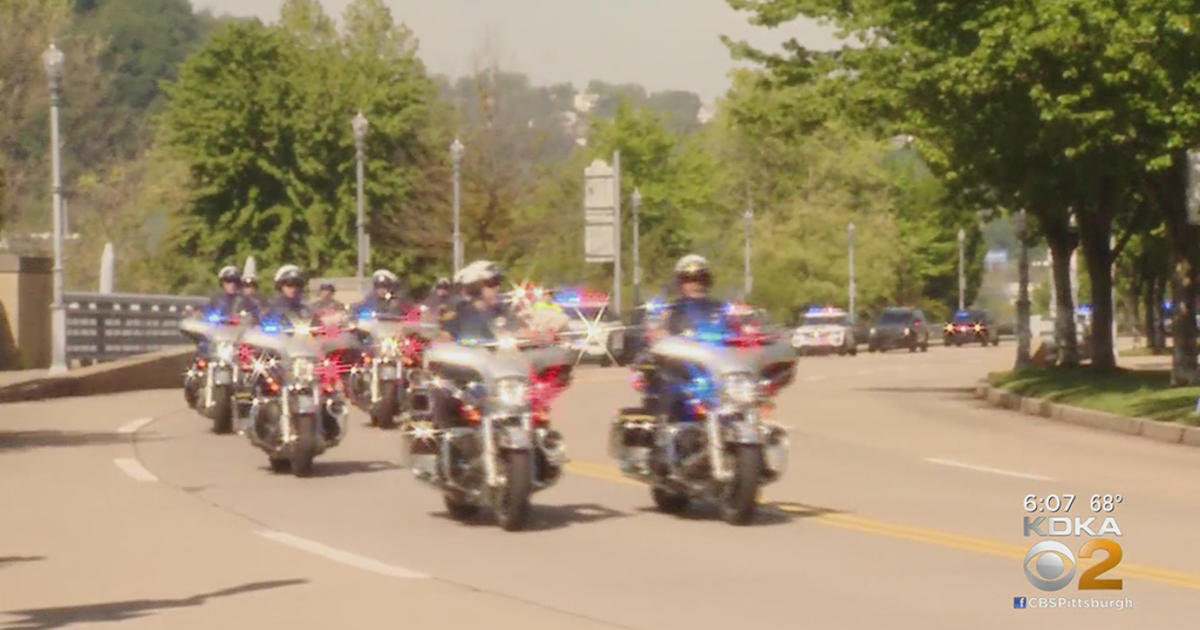 'A Solemn Day For A Solemn Ride' Local Police Honor Fallen Officers