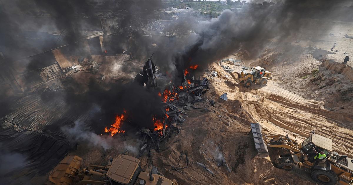 Israeli airstrikes pound Gaza City again and Hamas fires more rocket barrages at Israel as fighting enters second week