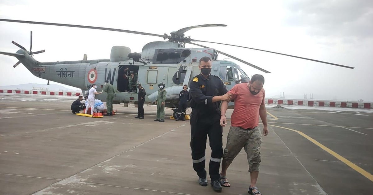 India scours sea after barge sinks during deadly cyclone