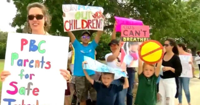 Mask debates rage across U.S. after new CDC guidance