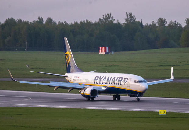 The Ryanair plane with registration number SP-RSM, carrying opposition figure Raman Pratasevich which was traveling from Athens to Vilnius and was diverted to Minsk after a bomb threat, lands at the International Airport outside Vilnius, Lithuania, Sunday, May 23, 2021. MINDAUGAS KULBIS / AP
