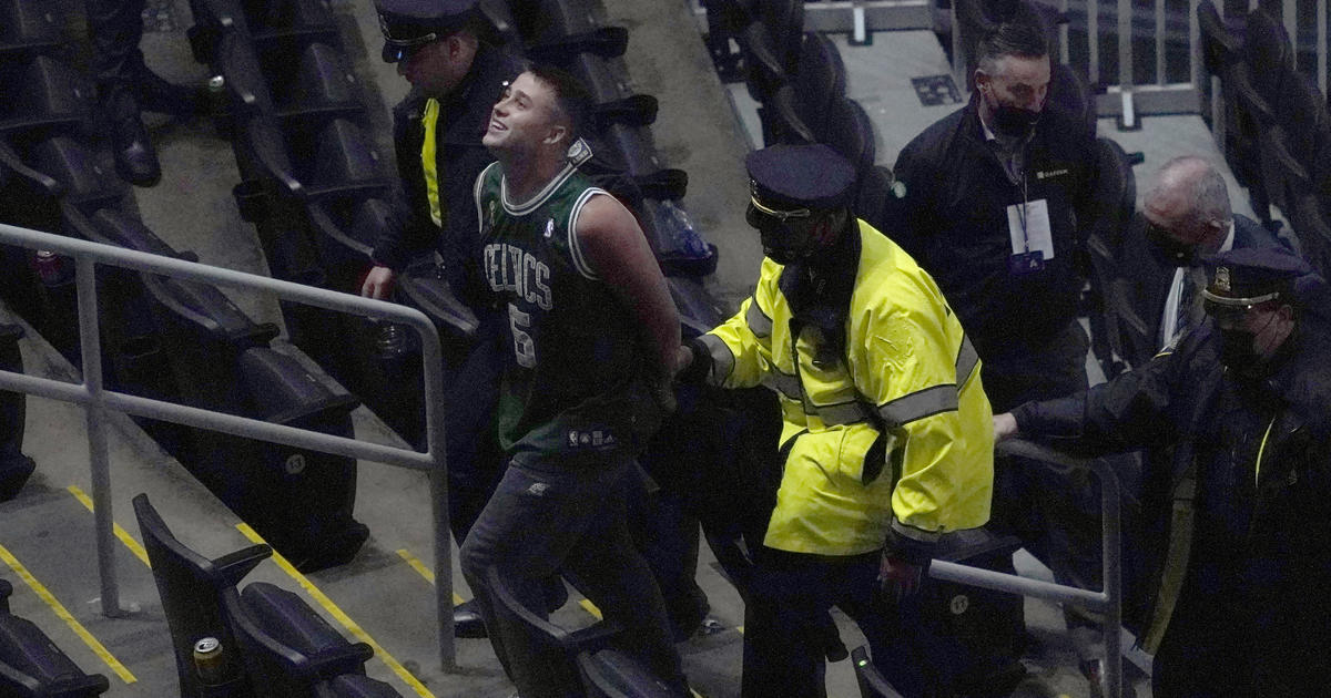 In ugly incident in Boston, fan tosses water bottle at Brooklyn Nets' Kyrie Irving, who blames "underlying Racism"