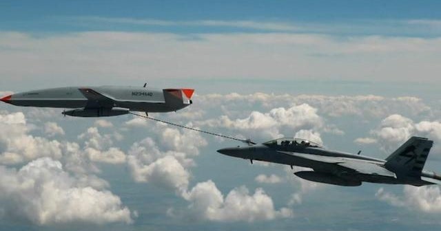 Drone refuels U.S. Navy fighter jet in midair for first time