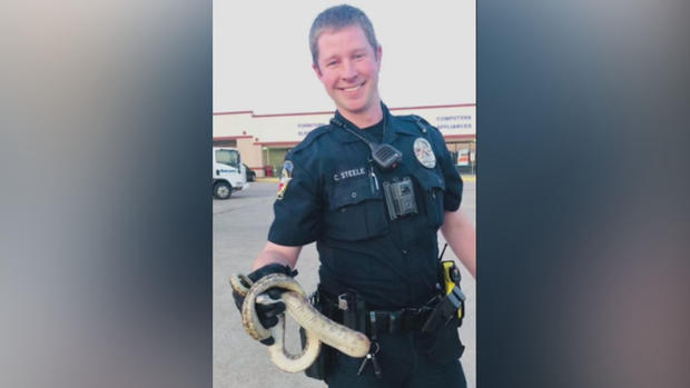 McKinney Officer Chance Steele with snake 