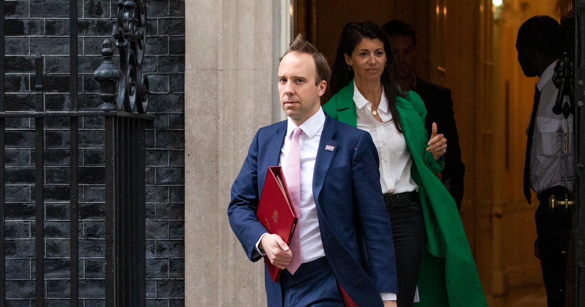 U.K. health chief caught on camera in COVID-rule-breaking tryst