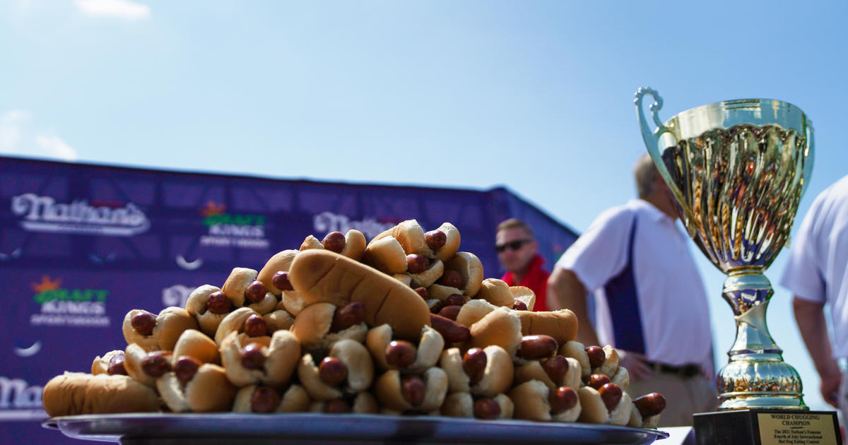 Joey Chestnut beats own record at Nathan's Hot Dog Eating Contest, downing 76 in 10 minutes