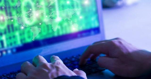 Ukraine says financial and defense sites under attack by hackers