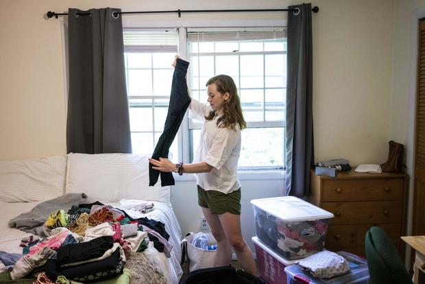 Hanover, NH - June 19:Caroline Casey gets unpacks in her new o 