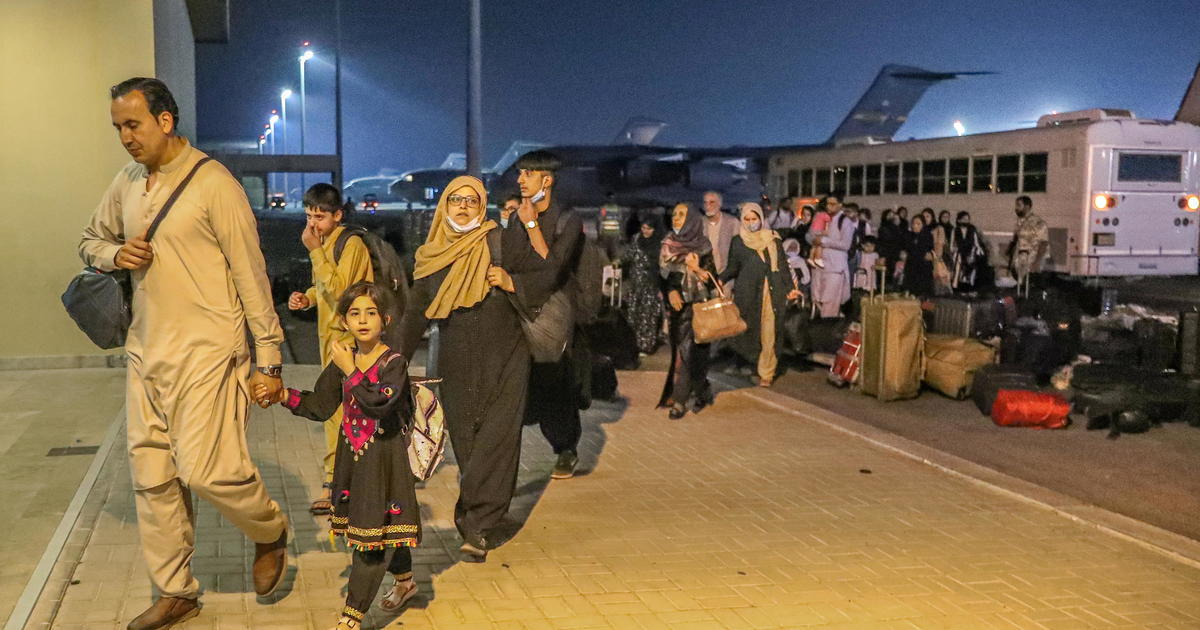 Desperation at both ends of the frantic Afghanistan evacuation route as U.S. facility in Doha reaches capacity