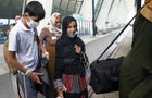 Afghan refugees arrive at Dulles Airport in Virginia 