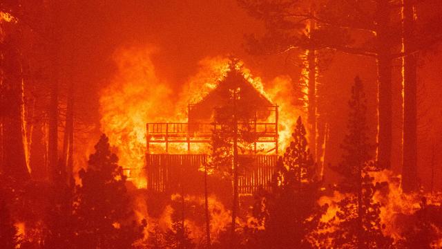 Caldor Fire burning a home near South Lake Tahoe, California 