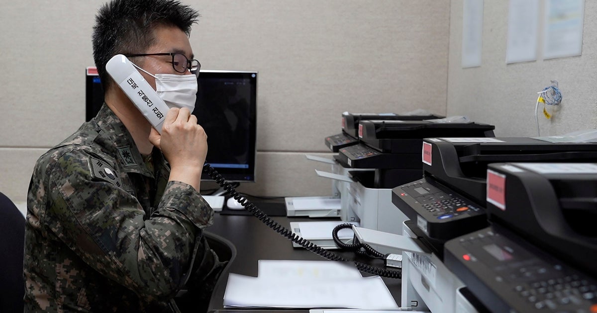 Koreas reactivate cross-border hotline and speak on it
