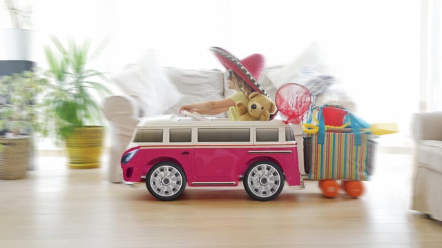 Child going on holiday in toy car 