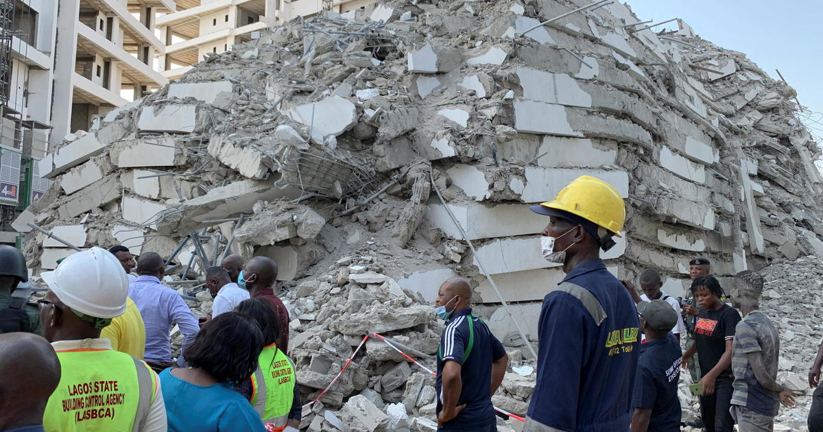 Dozens feared trapped after deadly high-rise building collapse in Nigeria -  CBS News