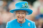 Queen Elizabeth II tours Queen Mother Square on October 27, 2016, in Poundbury, England. 