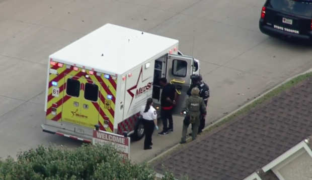Fort Worth standoff suspect at ambulance 