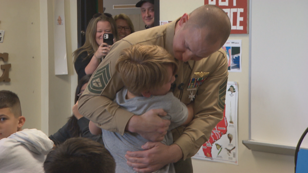 Marine dad surprises sons 