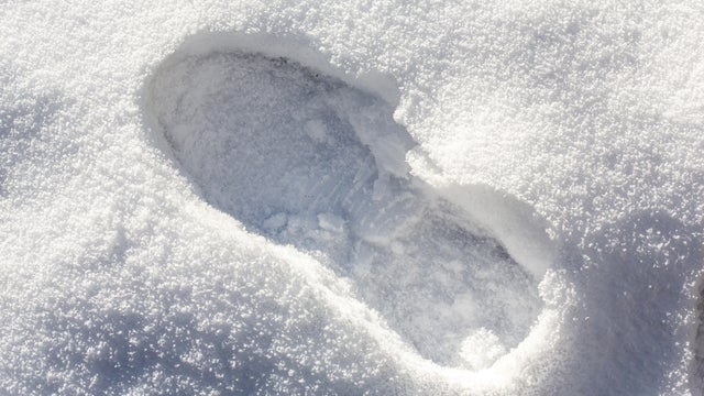 Shallow boot print in the snow 