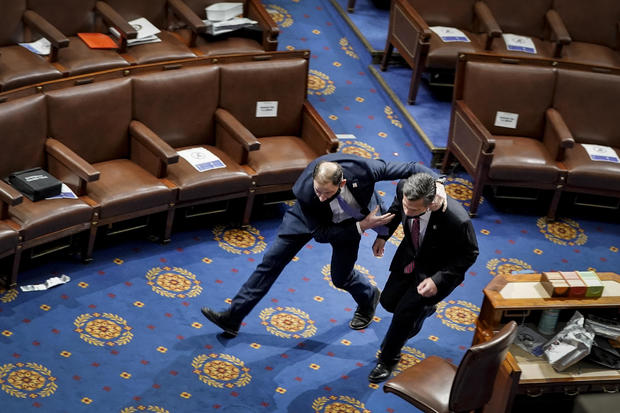 Lawmaker evacuates the House Chamber during January 6 Capitol riot 