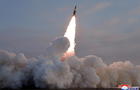 FILE PHOTO: A tactical guided missile is launched, according to state media, at an undisclosed location in North Korea 
