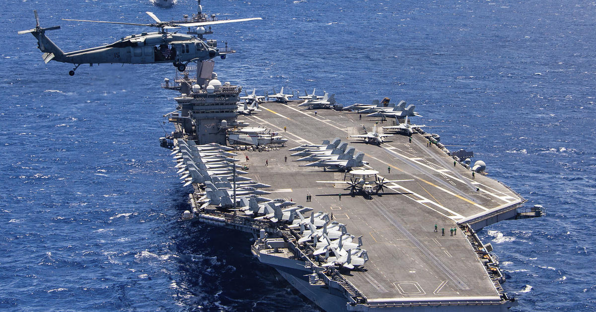 Pilot ejects before U.S. combat jet crashes into aircraft carrier in South China Sea; 7 injured