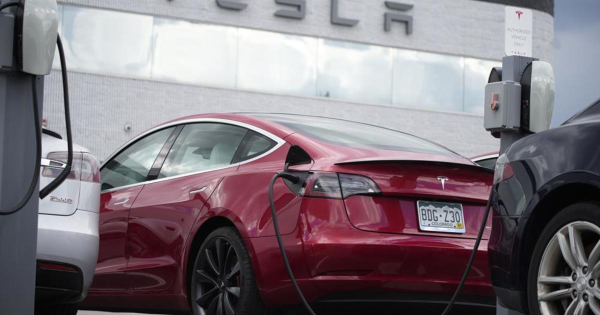 Tesla recalls nearly 54,000 cars because self-driving software runs stop signs