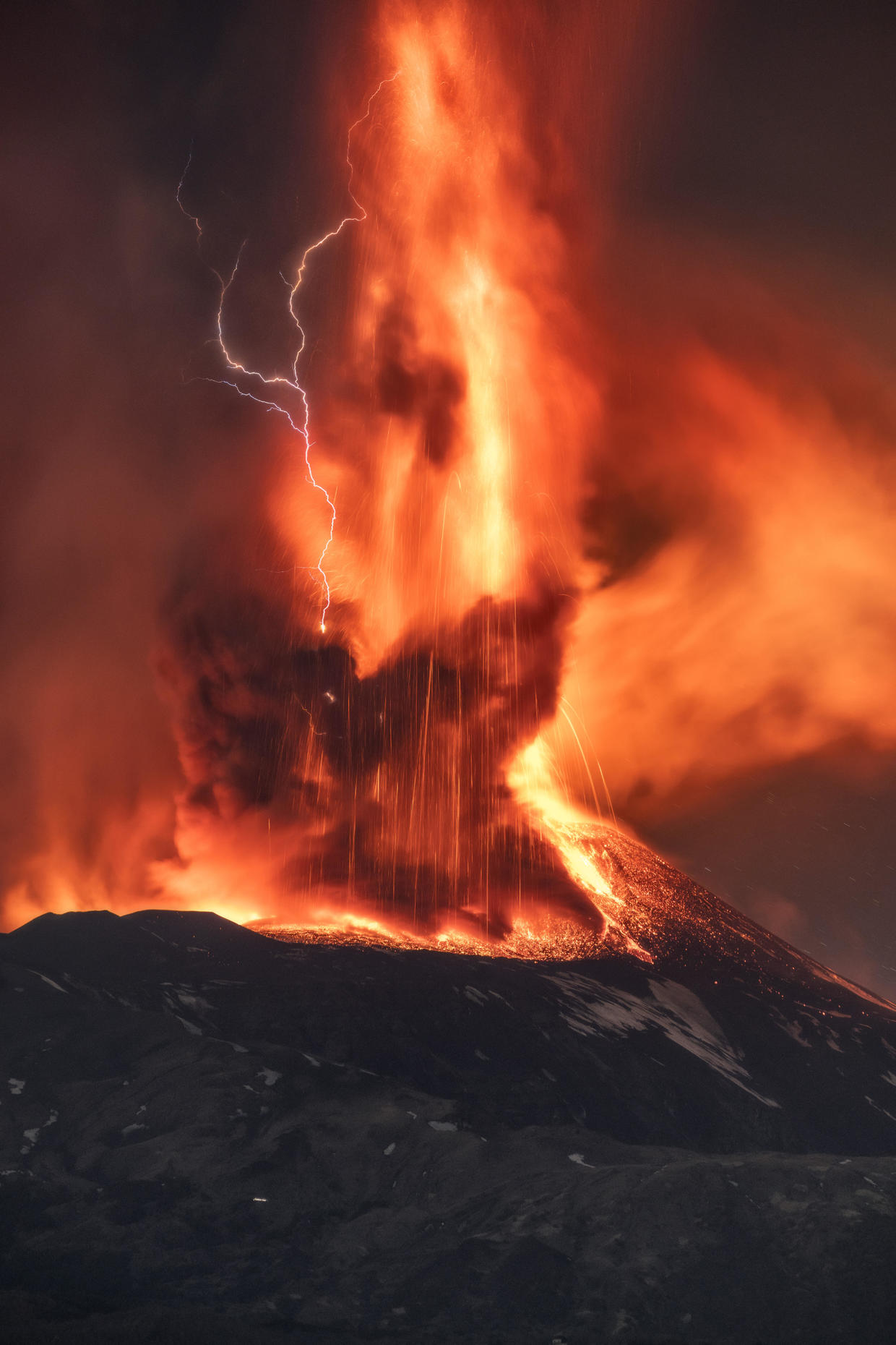 Photo captures Mount Etna eruption creating rare volcanic storm