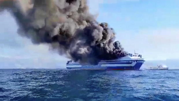 Smoke rises from the Italian-flagged Grimaldi Euroferry Olympia that caught fire off the coast of Corfu island 