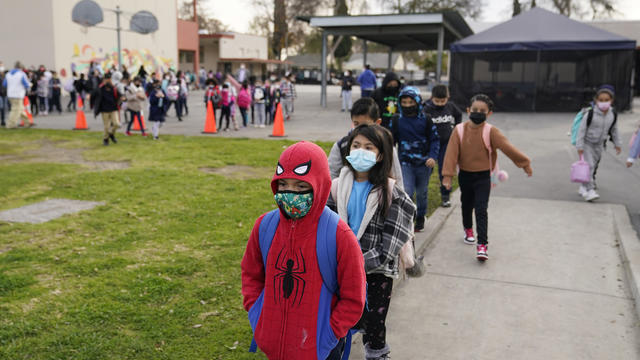 Virus Outbreak Masks in Schools 
