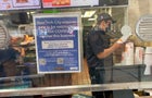 Vaccine Mandate sign at Burger King Fast food restaurant, Queens, New York 